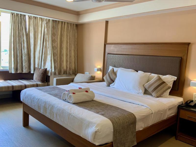 Sai Towers Hotel Puttaparthi Bagian luar foto