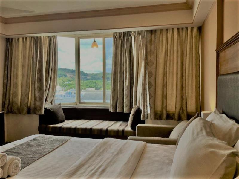 Sai Towers Hotel Puttaparthi Bagian luar foto