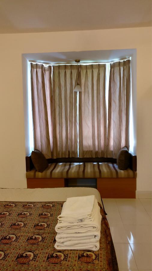 Sai Towers Hotel Puttaparthi Bagian luar foto