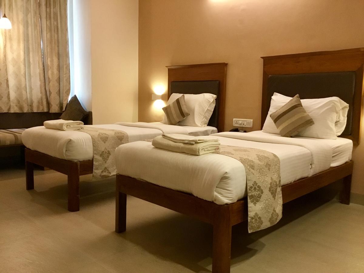 Sai Towers Hotel Puttaparthi Bagian luar foto