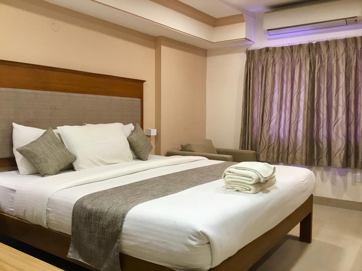 Sai Towers Hotel Puttaparthi Bagian luar foto