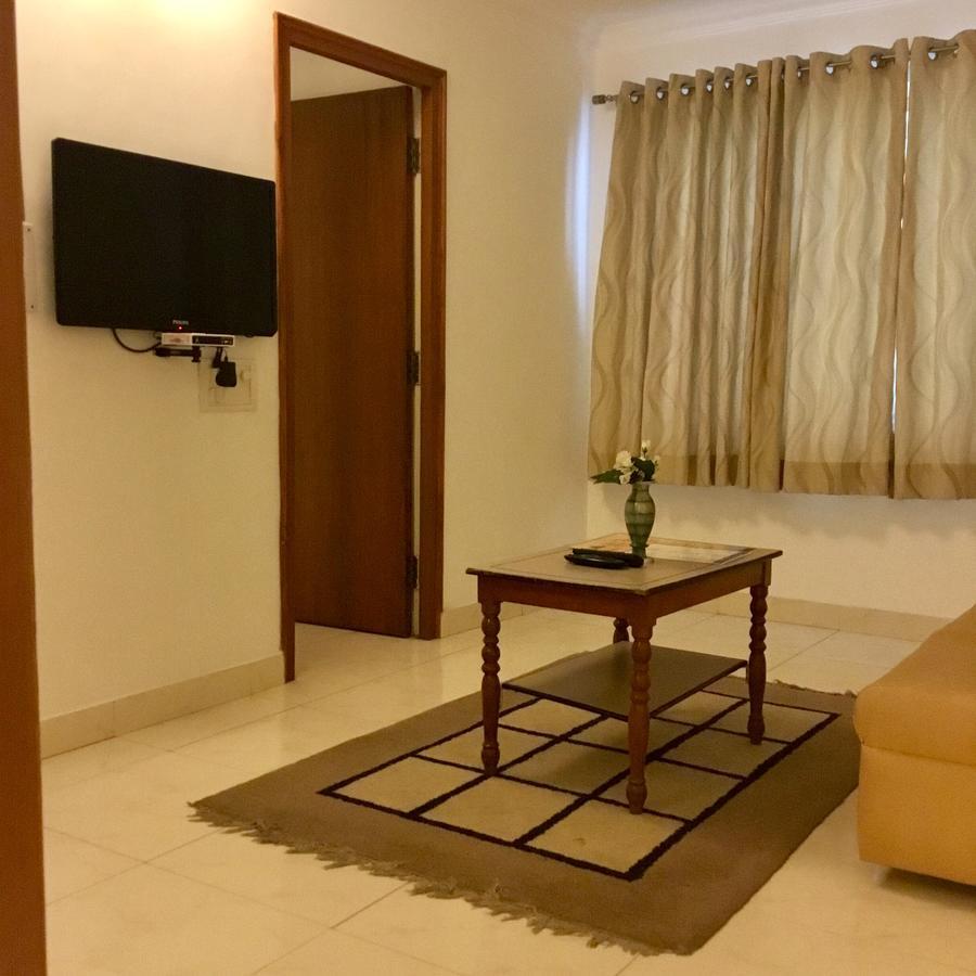 Sai Towers Hotel Puttaparthi Bagian luar foto