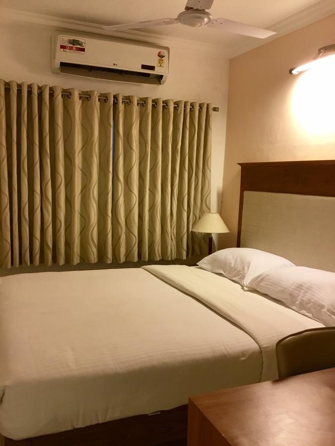 Sai Towers Hotel Puttaparthi Bagian luar foto
