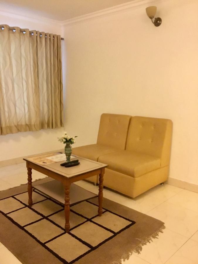 Sai Towers Hotel Puttaparthi Bagian luar foto