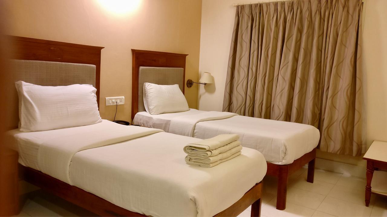 Sai Towers Hotel Puttaparthi Bagian luar foto
