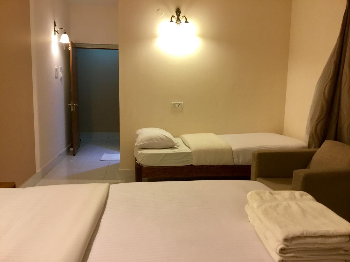 Sai Towers Hotel Puttaparthi Bagian luar foto