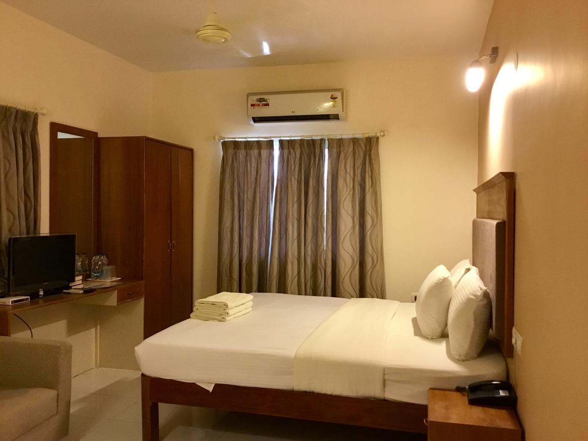 Sai Towers Hotel Puttaparthi Bagian luar foto