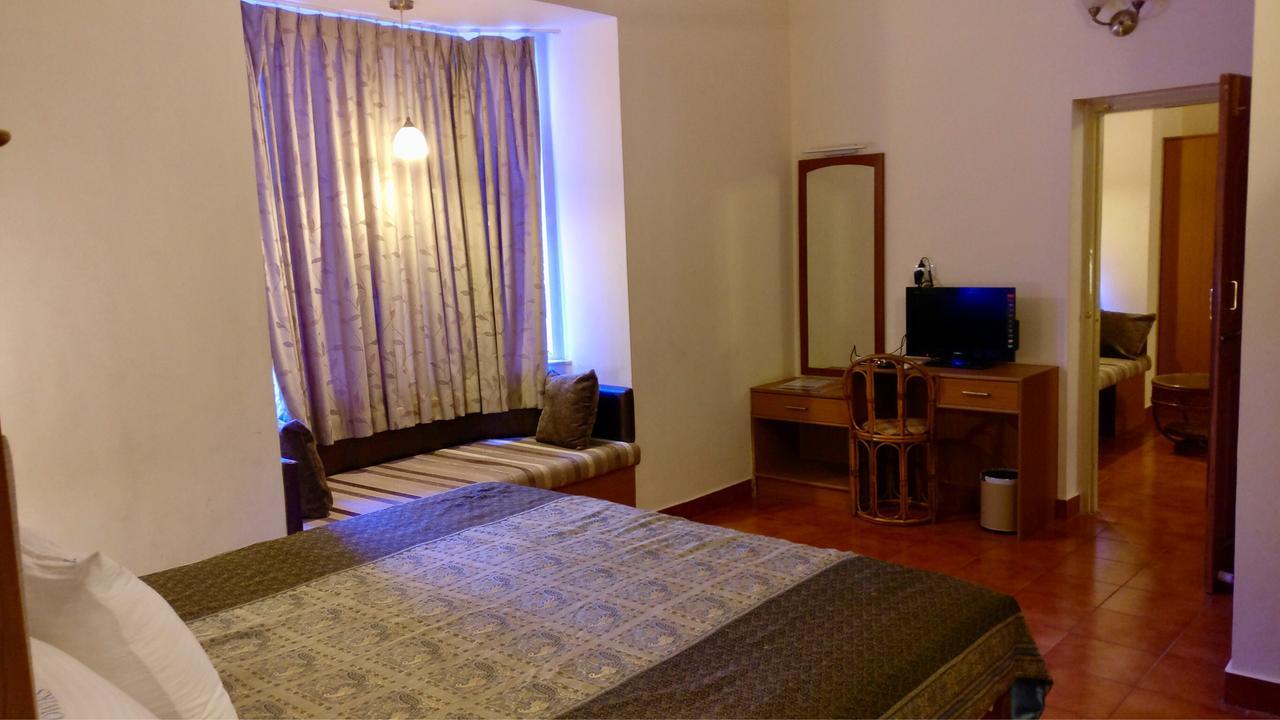 Sai Towers Hotel Puttaparthi Bagian luar foto